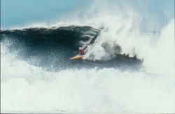 surfing big wave